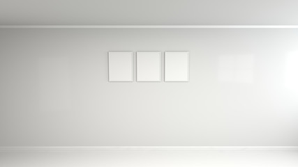 Blank white poster in white frame on the wall