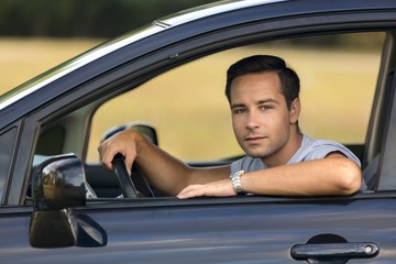 Portrait of a Man in his Car