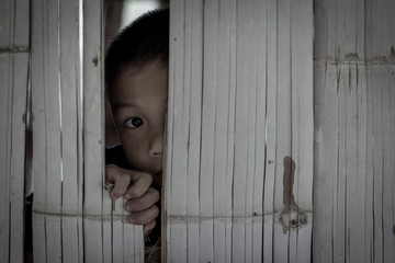 Stop violence against children and anti-trafficking concept, violence, terrified , A fearful child....