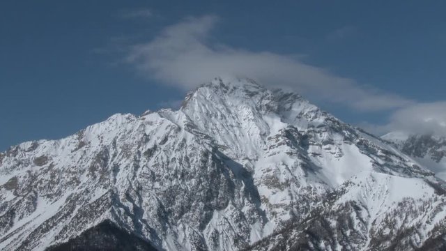 Panorama of Mount Chaberton, 3130 mt. with clouds on the top. Alps, Italy. Winter. Static