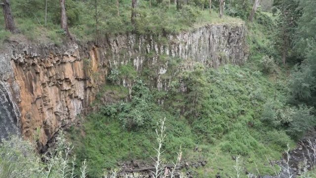 Trentham Falls plunges 32 metres over basalt columns onto the quartz gravel below. T Trentham Falls can be accessed from Trentham Scenic Reserve Road. Victoria, Australia.