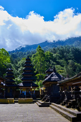 Colorful Balinese landscape with a temple. Temples in Pura Penataran Agung Besakih complex, the mother temple of Bali, Indonesia. Several balinese temples. Travel and ancient architecture background.