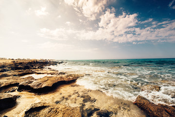 scenic beach wallpaper, seaside details with rocks and sunset.