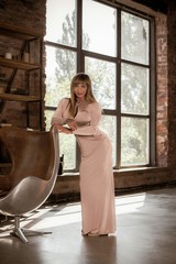 Hot sexy mature fit athletic woman demonstrates her body. Concept of sport, bodybuilding and women...