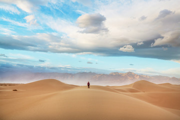 Fototapeta na wymiar Hike in sand desert