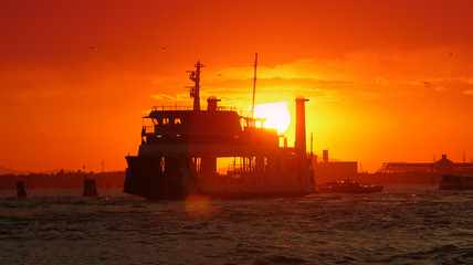 Fototapeta premium boat or cruise ship at sunset. Venice, Italy