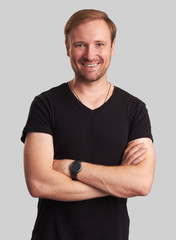 Cheerful guy smiling. Isolated