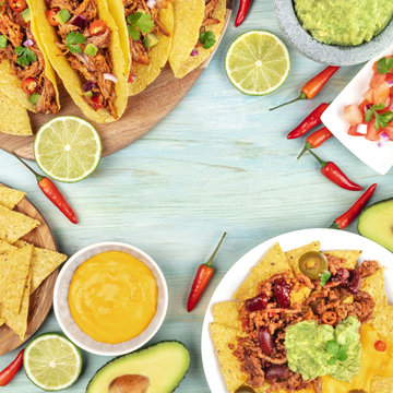 Overhead photo of an assortment of Mexican food with place for text