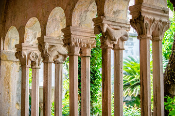 Fototapeta premium Colonnade in the ancient Catholic Church of Dubrovnik, Croatia. 