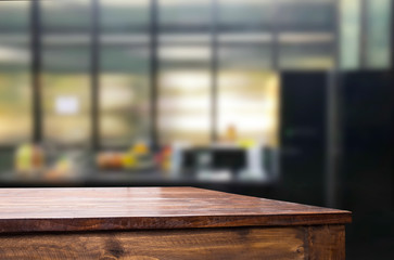 Wood table top on blur kitchen or cafe room background .For montage product display design key visual layout