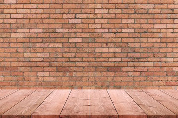 Empty wood table top and background of old brick wall - can used for display or montage your products.