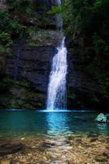 Fototapeta na wymiar Waterfall Fermona, Italy