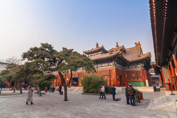 People at the Yonghegong Lama temple in Beijing, China © venemama