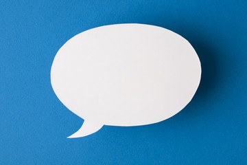 speech bubble on blue background