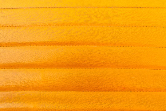 Yellow leather sofa close up