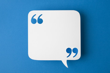 speech bubble on blue background - Powered by Adobe