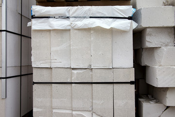 New aerated concrete blocks on pallets stored outdoors