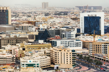 Aerial view on Deira City Center in Dubai, UAE, on a summer day. Travel background.