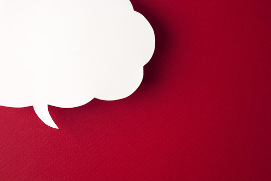 speech bubble on red background