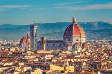 Santa Maria del Fiore cathedral in Florence, Italy in summer. Colourful skyline.