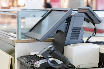 Trade equipment, cash Desk, computer, barcode scanner. Working place of the seller.