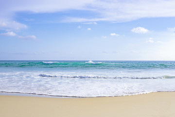 Sea view from tropical beach. Summer paradise beach of island with clouds on horizon. Ocean beach relax, outdoor travel.