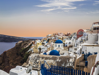 Oia on island Santorini at sunset, Greece