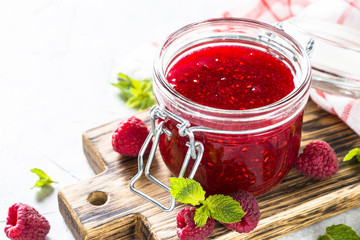 Strawberry jam in glass jar.