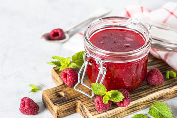 Strawberry jam in glass jar.