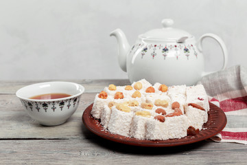 Turkish delight on a wooden table.