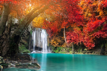 Amazing beauty of nature, waterfall at colorful autumn forest 