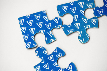 Missing pieces of jigsaw puzzle. Unfinished work needs to be completed. Business team work, solving...