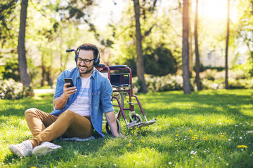 Handicapped man enjoying music