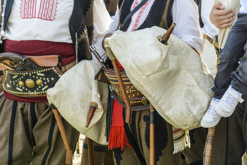 traditional costume in bulgaria, Belt and gun attached .