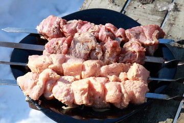 Vegetables, meat, mushrooms and bread toasted at the stake and bbq