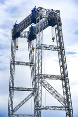 Metal constuction, crane in the port.