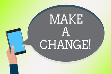 Fototapeta premium Word writing text Make A Change. Business concept for Try new thing Evolve Evolution Improvement Growth Mature Man holding cell phone text chat message checking social media accounts.
