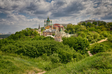 Fototapeta na wymiar Beautiful view of the ancient street Andrew's Descent and the St. Andrew's Church. Kiev, Ukraine