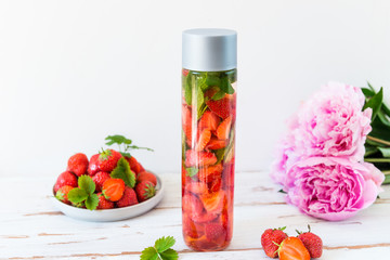 Detox Infused Water with Strawberries and Mint in Sports Bottle