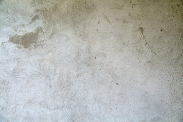 the texture of a cementitious uniform wall of gray color