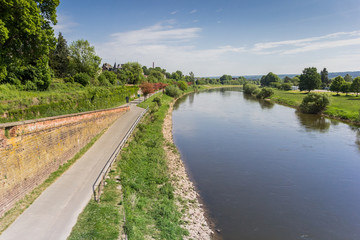 Fototapeta na wymiar Road along the Weser river near Hoxter, Germany