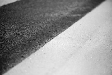 Traffic line painting. Freshly painted white street lines on pedestrian crossing
