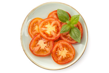 Teller mit Tomatenscheiben