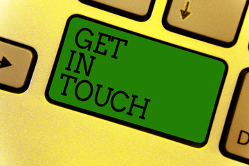Conceptual hand writing showing Get In Touch. Business photo text Stay in contact Constant Communication Interaction Bonding Keyboard green create computer computing reflection document.