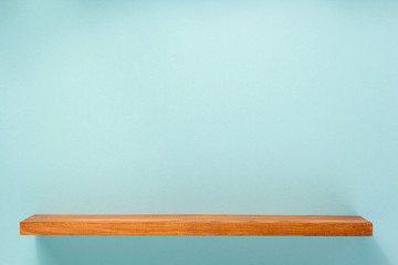 woden shelf at abstract wall background