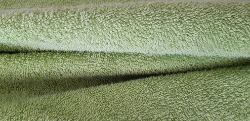 Toalla verde con relieve