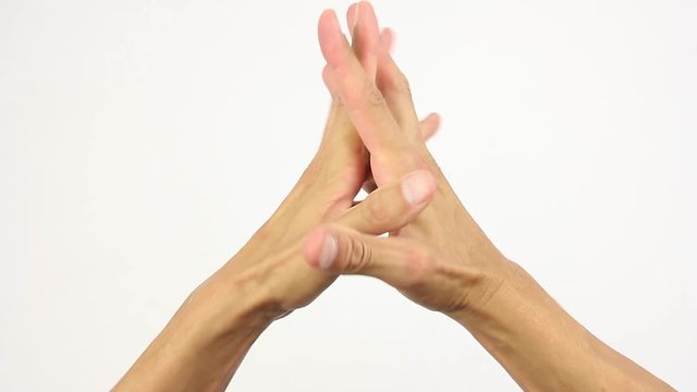 right and left human hands are connected in a lock, then splits and removed in different directions, white background