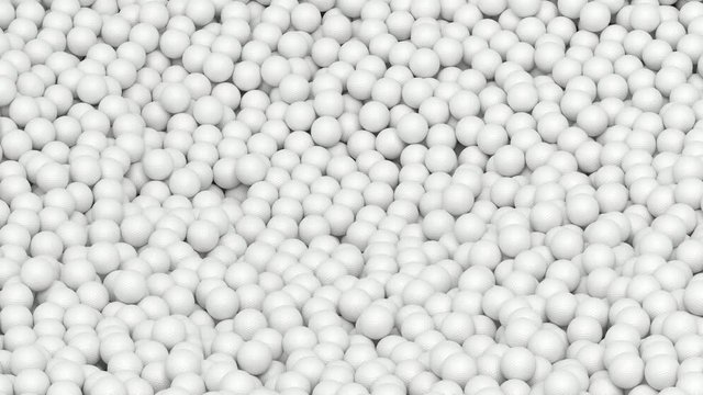 Animated close up of a great amount of fallen and laying in pile plain white golf balls. Full 360 degree rotation and loop able.