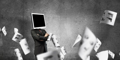 Businessman with monitor instead of head.