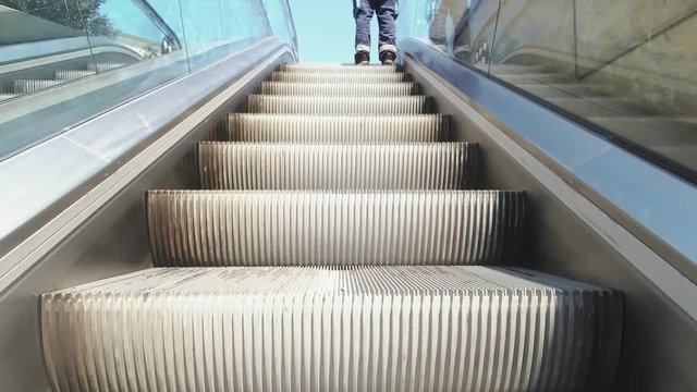 Outdoor escalator moving up, Close up.